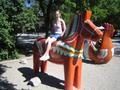 At Skansen... sitting on a large Dala horse