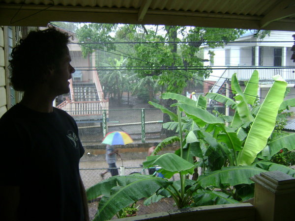  Darren watching the rain from our balcony.