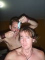 Mike cutting my hair with toe nail scissors!