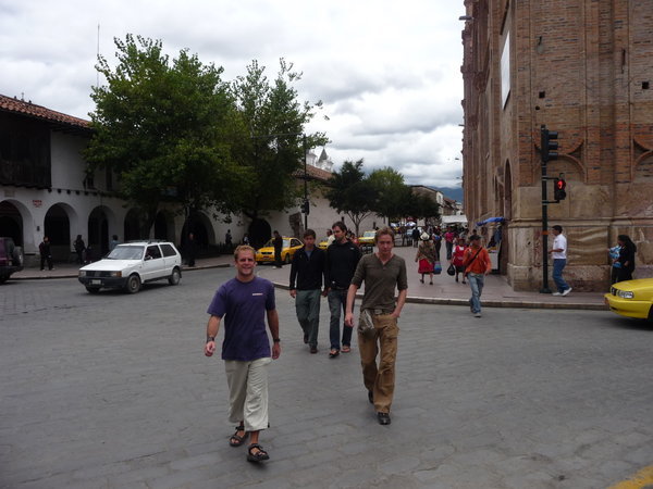 The boys walking around Cuenca.