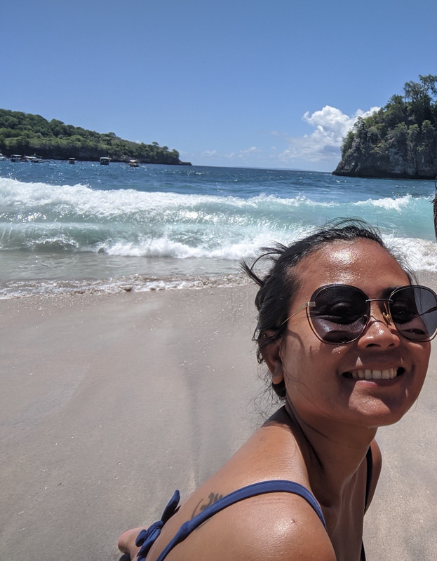 Salty hair, red wine toe nails, and sun kissed skin in Nusa Penida beach