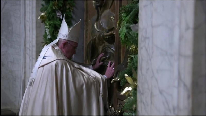 Papa Francesca opening the door