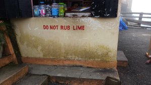 Request for not rub lime on the wall of a Paan Bidi shop (see the lime all over)