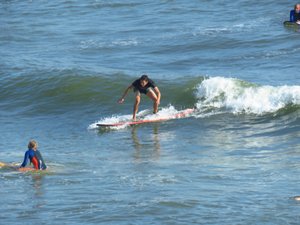 Surfers on the Pacific Ocean, Lima