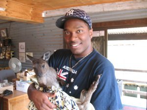 holding a little kangaroo on Kangaroo Island