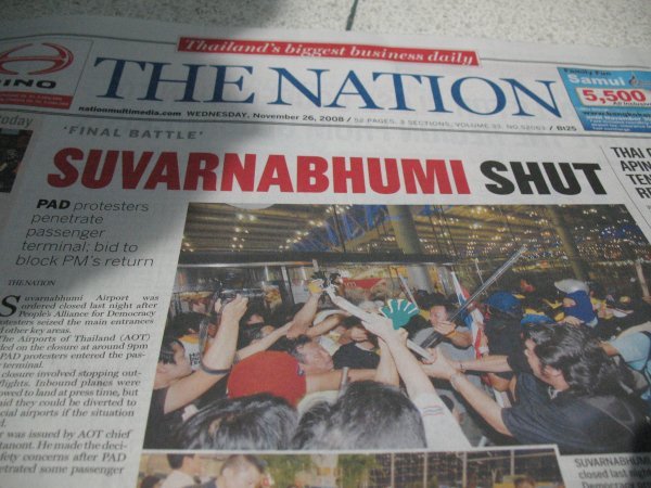 newspaper in Bangkok showing that the airport is closed