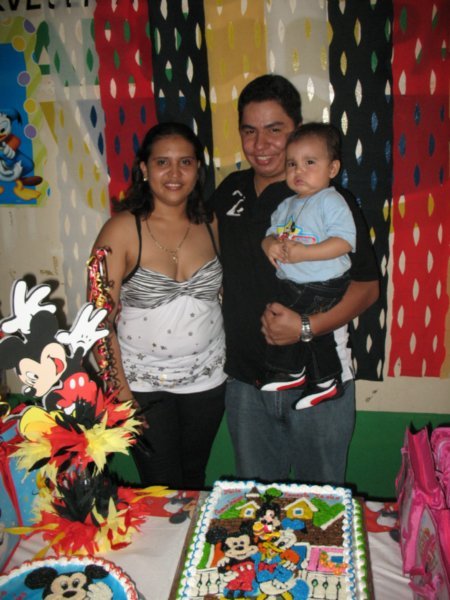 Maria, Ernesto and their kid at the birthday party