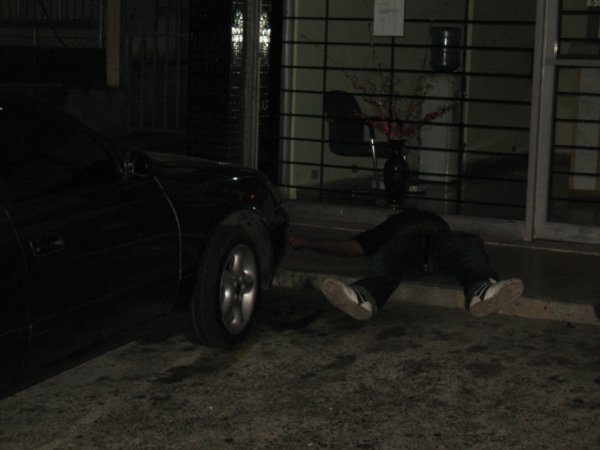 drunk guy sleeping on the street at Transístmica