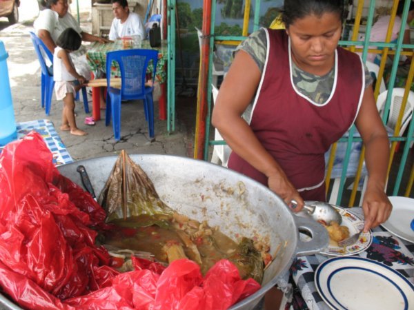 woman selling the typical dish "Baho" in Managua