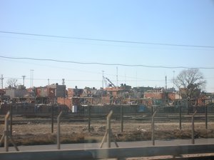a slum in Buenos Aires, seen from the train