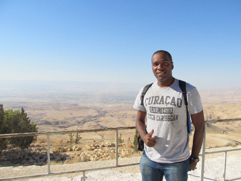 On Mount Nebo with Moses' "promised land" in the background