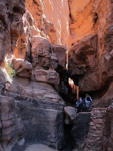 Walking in a small canyon in Wadi Rum desert