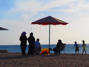 A Jordanian family enjoying an afternoon at the Red Sea, south of Aqaba