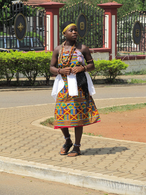 Kumasi; girl with Kente clothing