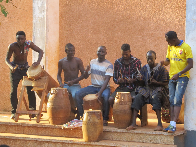 Tamale; group playing drums