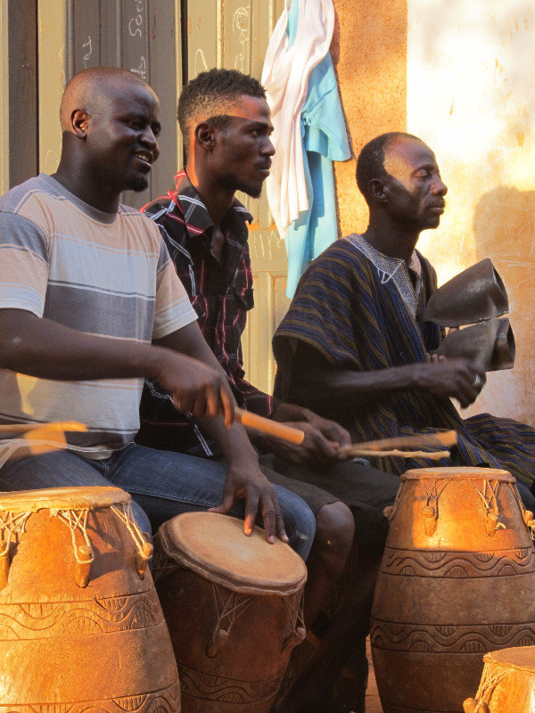 Tamale; group playing drums