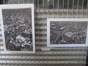 Display of photos of cyclone Tracy (1974) at the old Qantas Hangar in Darwin