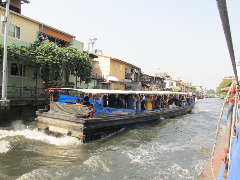 These boats through the channels are a form of public transportation in Bangkok