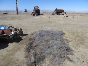 Some old nets and other equiment near the shore of the North Aral Sea in Tastubek