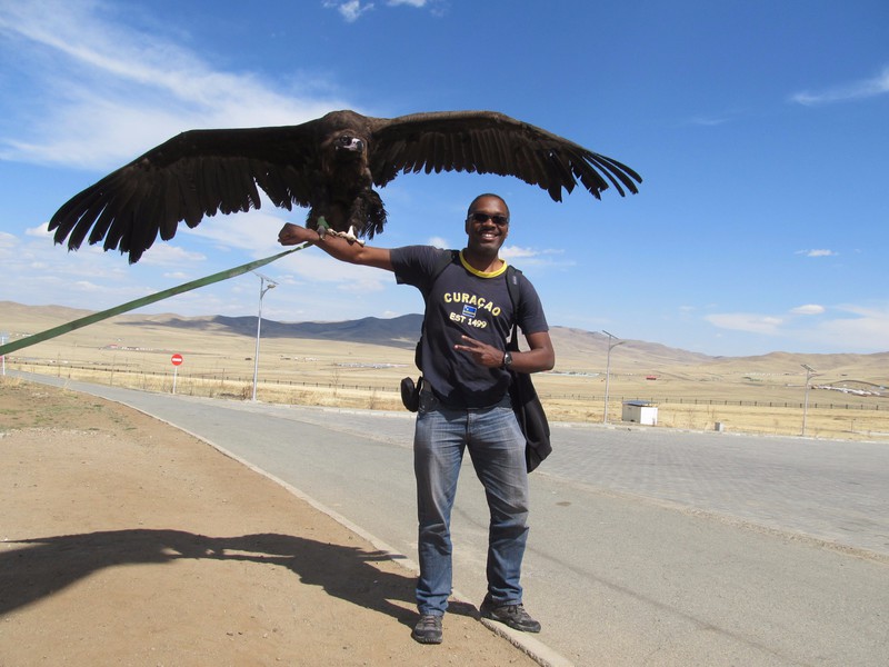 Posing with a vulture at Erdene