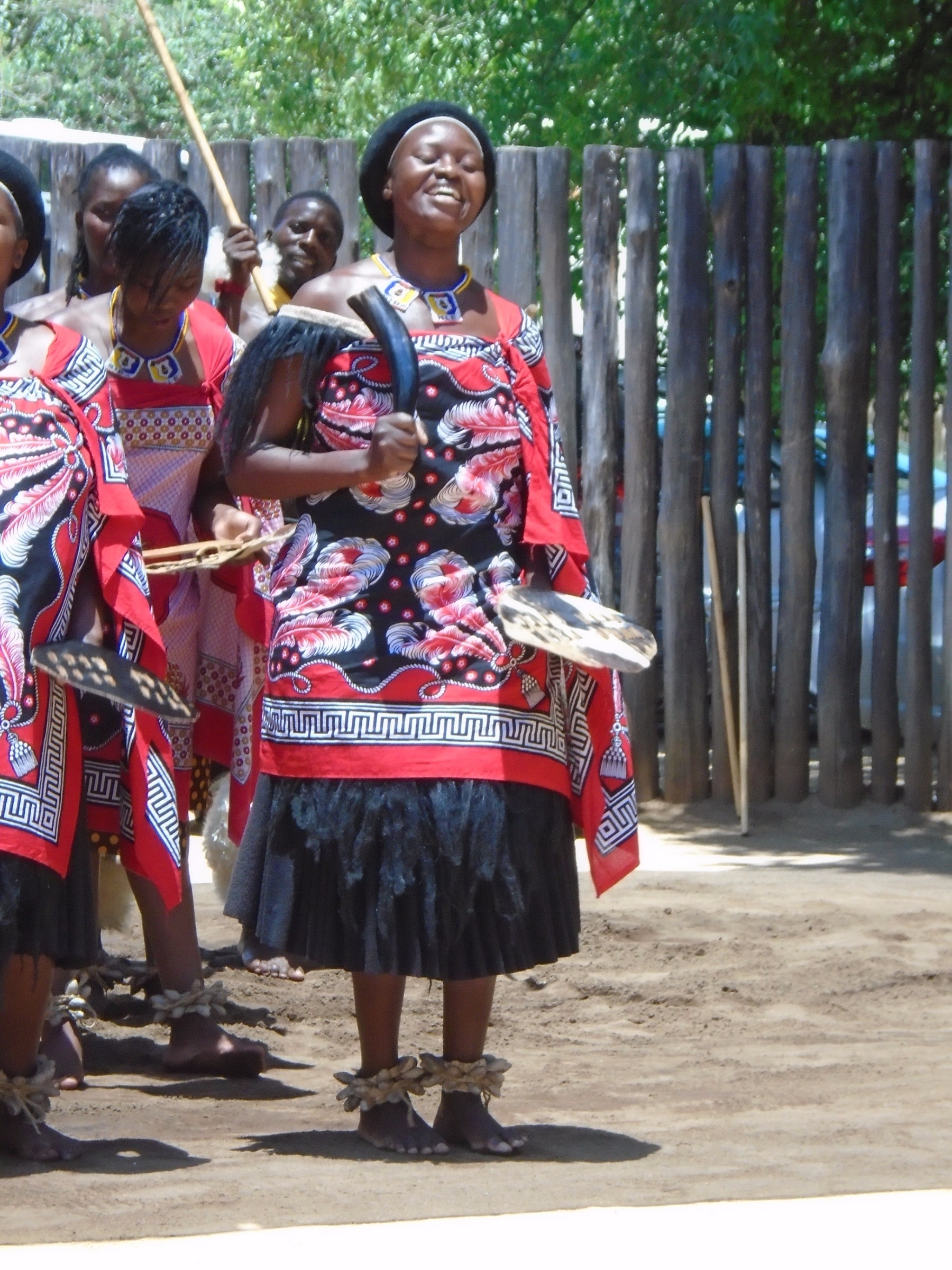 Swazi woman dancing at the Swazi Cultural Village | Photo