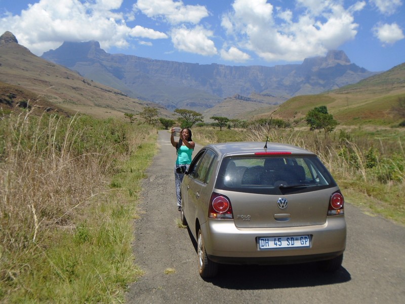 Nydia and our rental car in Royal Natal National Park