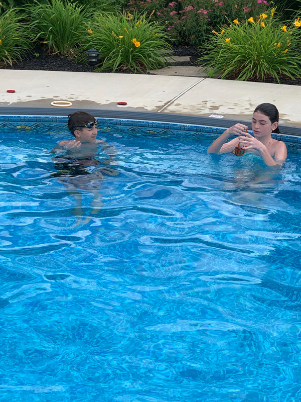 Two youngest swimming in the pool