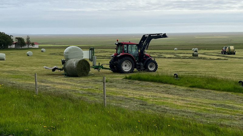 Farm equipment covering the bales of hay