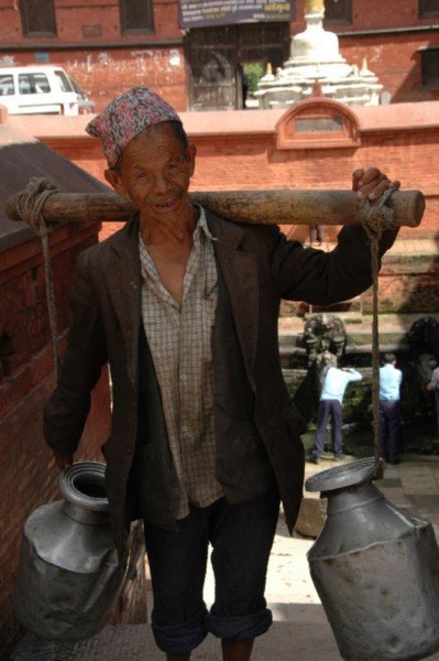 Nepali Local Carrying Water