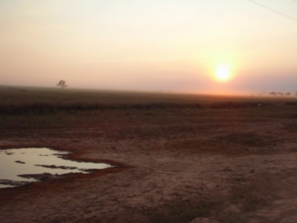 Sunsetting on as we bounce our way to Siem Reap