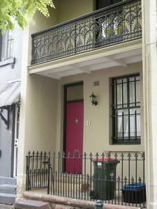 THE HOUSE WITH THE PINK DOOR