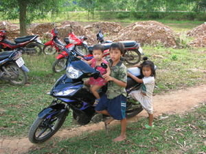 Chay Lap Kids on Motorbike