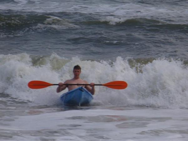 Dave D. riding a wave