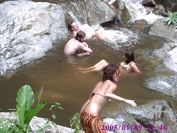 Some of the group relaxing in the waterfall