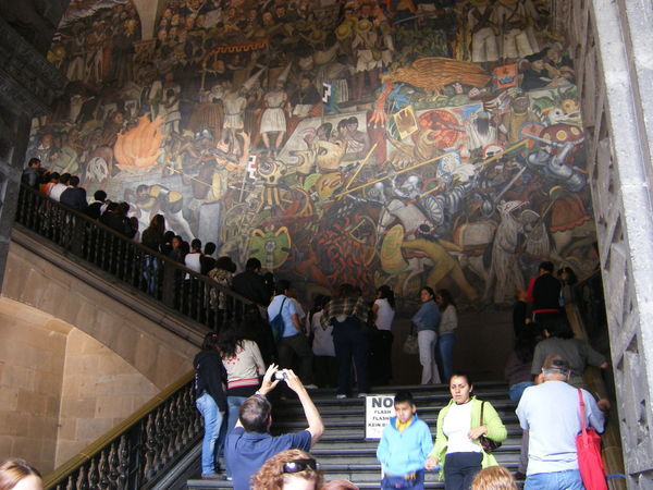 Rivera mural and admirers