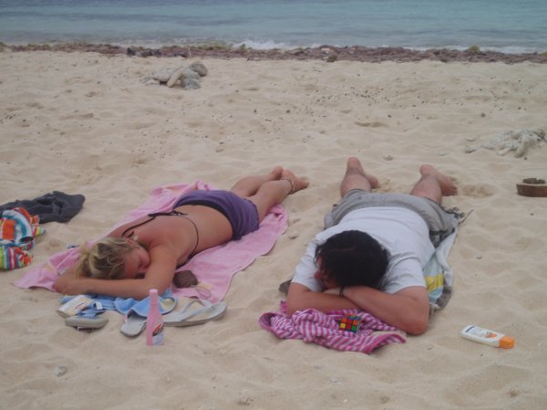 sleeping on the beach he he
