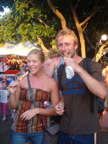 me and simon the french guy eating croc at mindil beach sunset market
