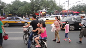 No helmets required in this crazy traffic