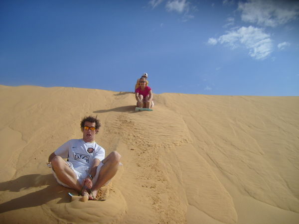 This is us attempting sand sledding!