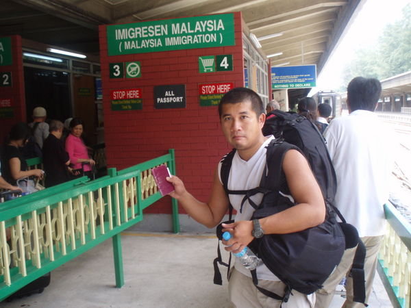 Trung at Malaysian Immigration Checkpoint