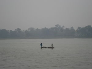 Locals Sail on the Perfume River in Hue'