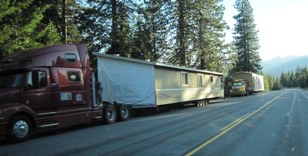 The Americans Like to Haul Stuff, any excuse.  Here is a house being pulled somewhere.