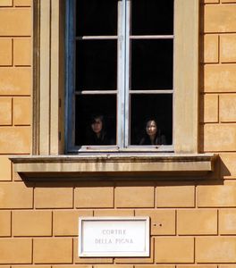 Girls look out from Vatican Museum windows, Rome