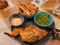 Nando's chicken, peas and fries