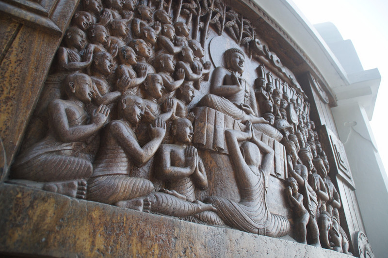 Carved Buddha Scene