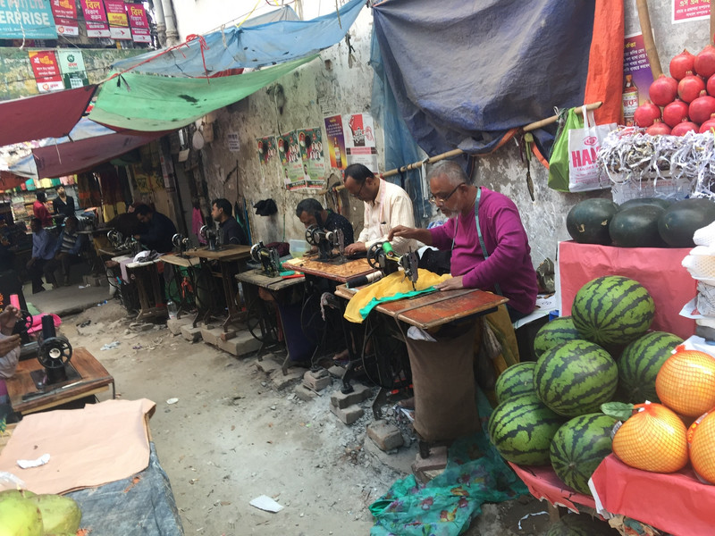 Tailors working on the street 