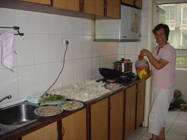 Xin's Aunt preparing the dumplings.