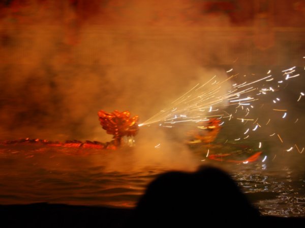 Dragon Spurts Fire in Water Puppet Theatre: Hanoi