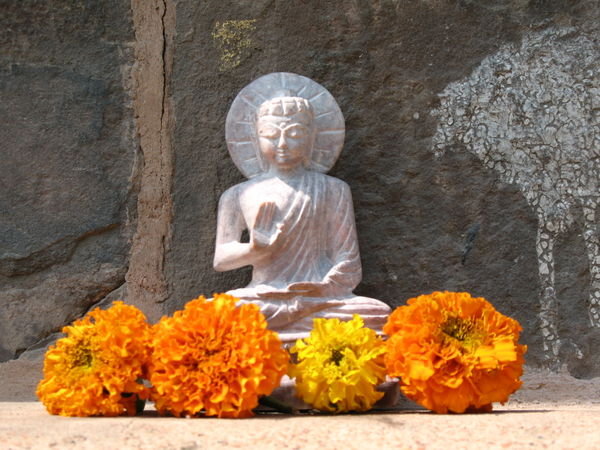 Sandstone Buddha on the Dhameka Stupa