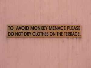Sign on the Hotel Balcony